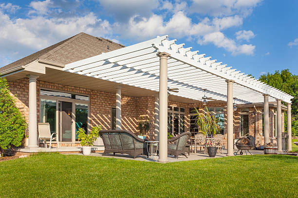 scenic brick house with large patio and pergola