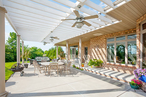 sunny backyard patio with pergola