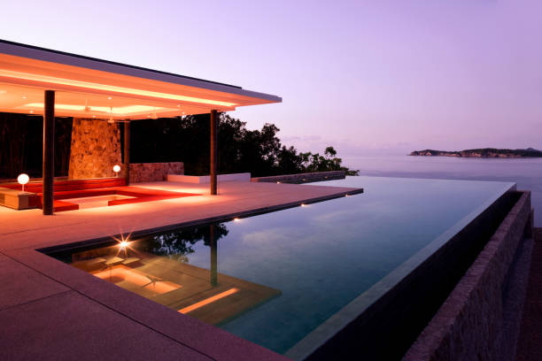 indoor outdoor tropical chalet with infinity pool and ocean view